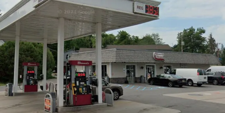 The road side view of Stewart's Shops in Tupper Lake with gas pumps and ample parking.
