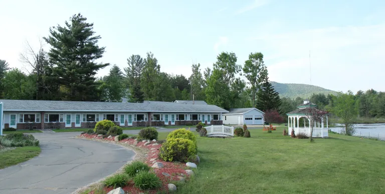 The green lawn outside Sara Placid Inn & Suites.